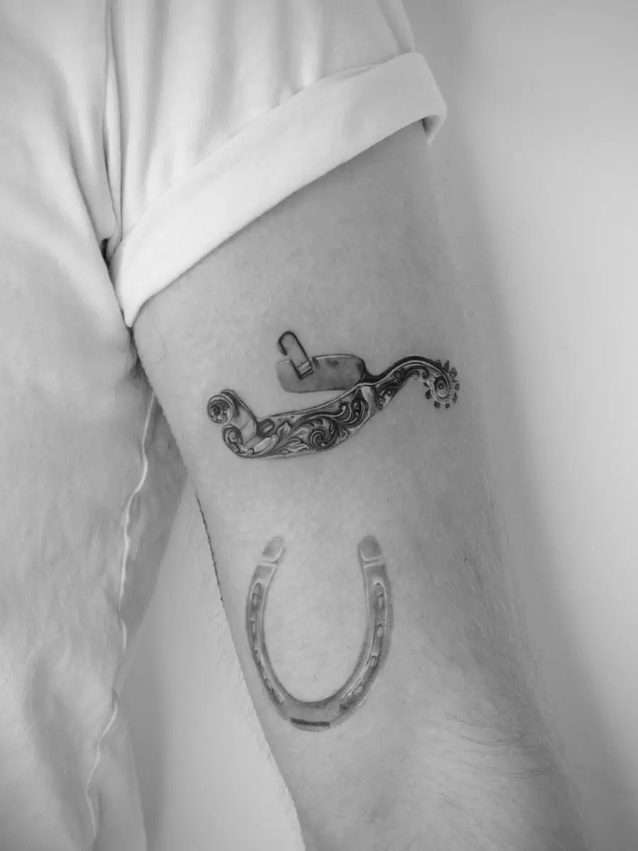 Elegant western-themed tattoo designs for arm.