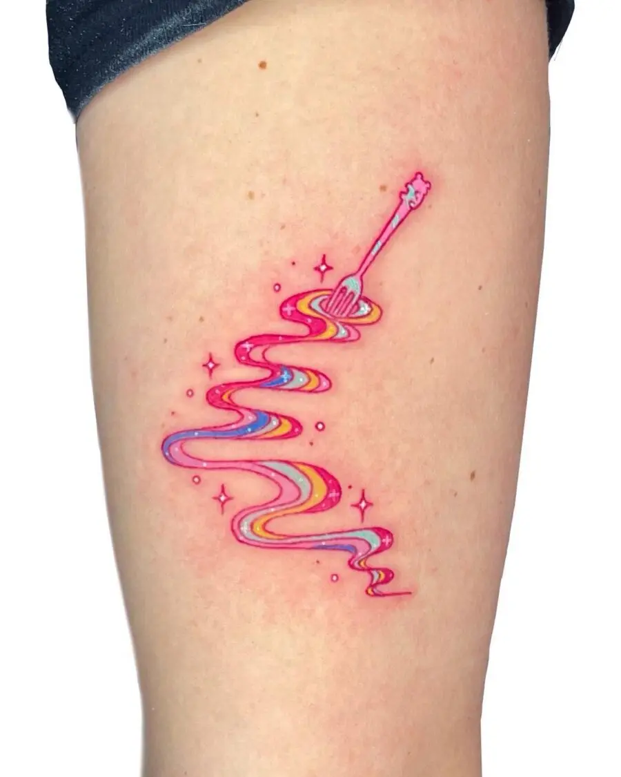Whimsical Rainbow Tattoo with Magical Vibes