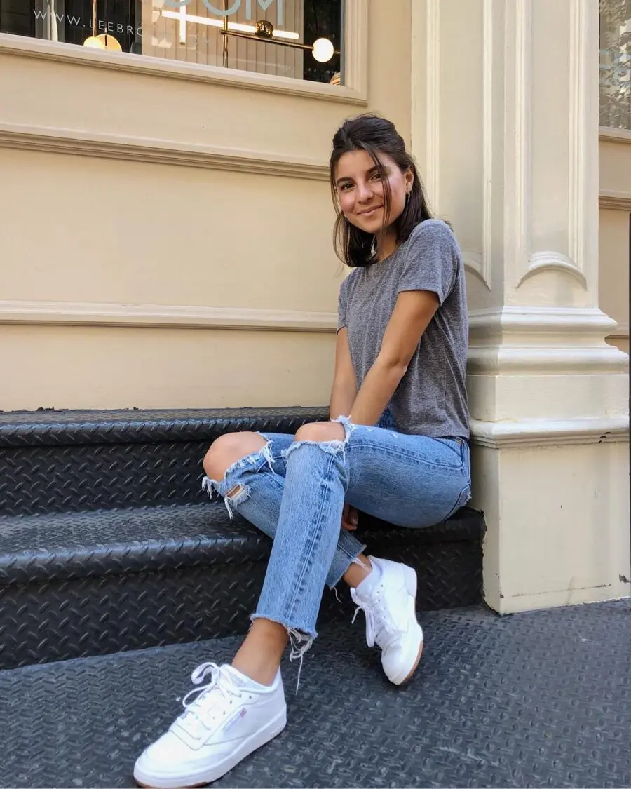 Chic Casual Look with White Sneakers and Ripped Jeans