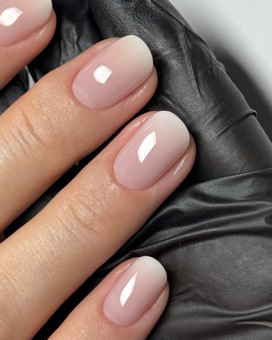 Elegant gradient baby boomer nail design.