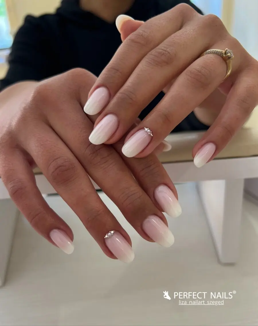 Chic baby boomer nails with subtle sparkle