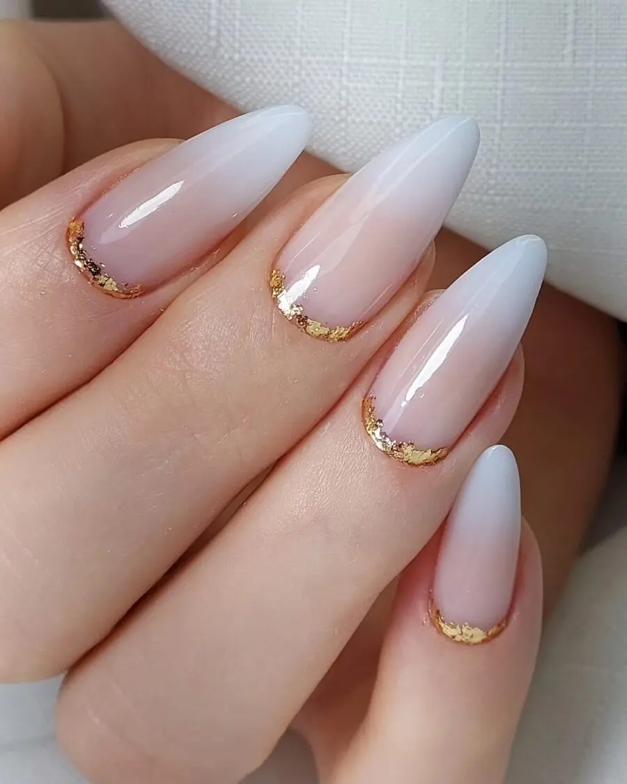 Elegant baby boomer nails with gold accents
