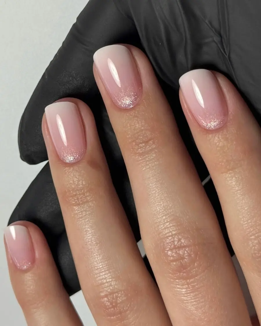 Elegant baby boomer nails with a touch of sparkle