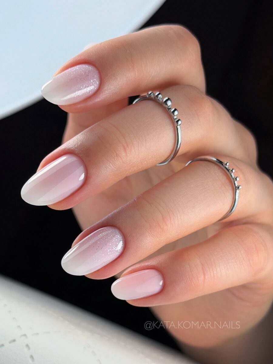 Elegant baby boomer nails with stunning rings