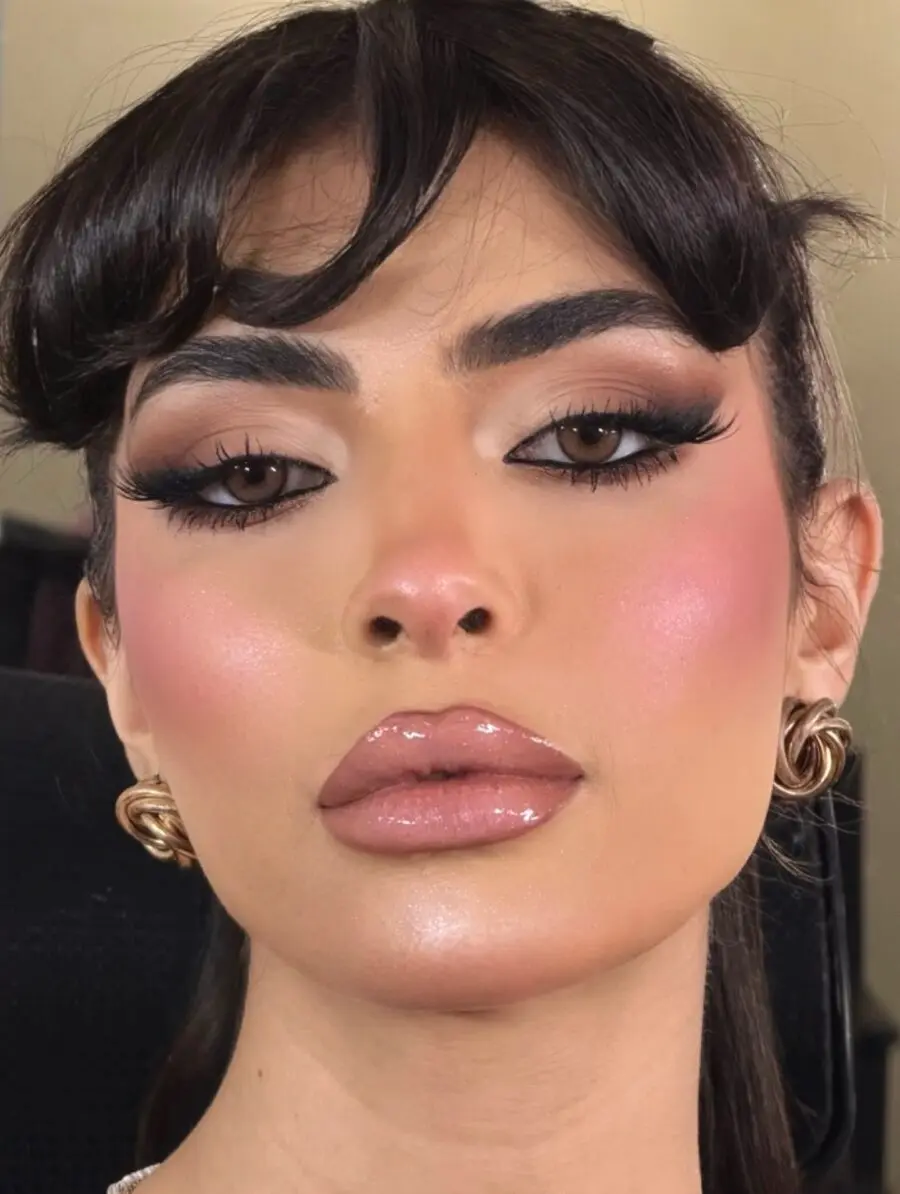 Radiant baddie makeup with bold accents