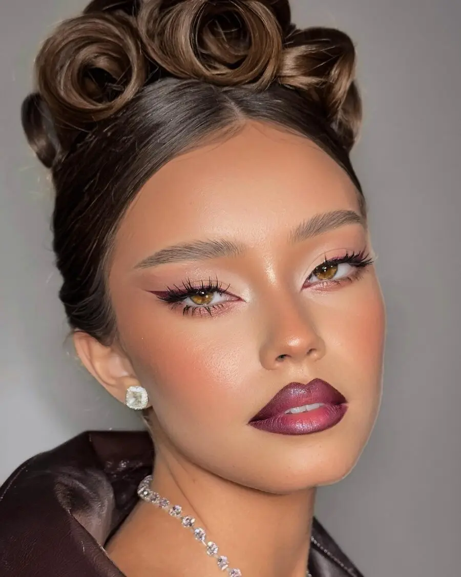 Bold lips and striking eye makeup blend perfectly