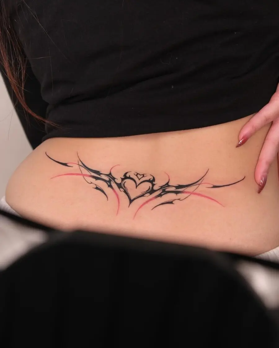 Elegant winged heart design on lower back