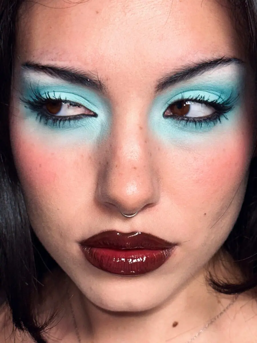 Striking aqua and deep lipstick glam look