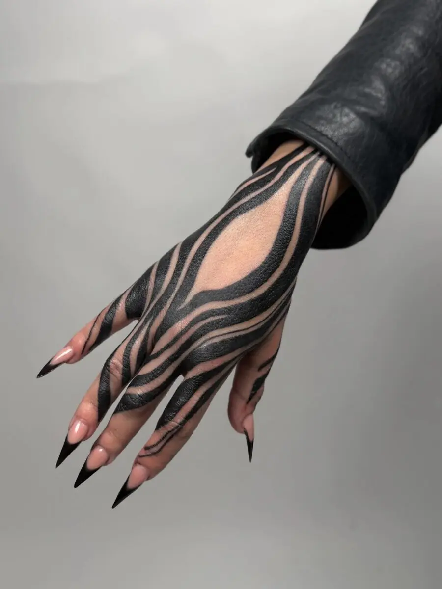 Striking Black Lines on Feminine Hand