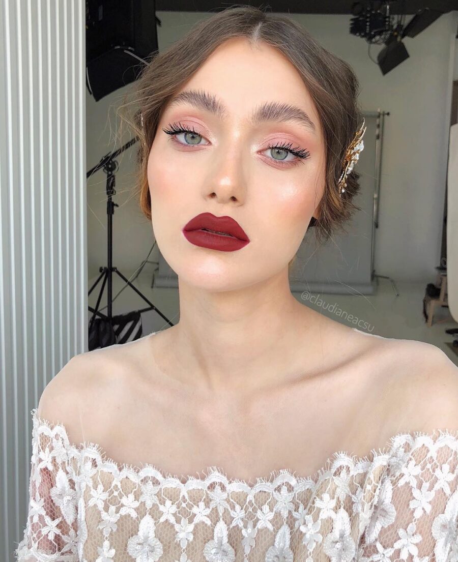 Elegant bridal makeup showcasing bold lips