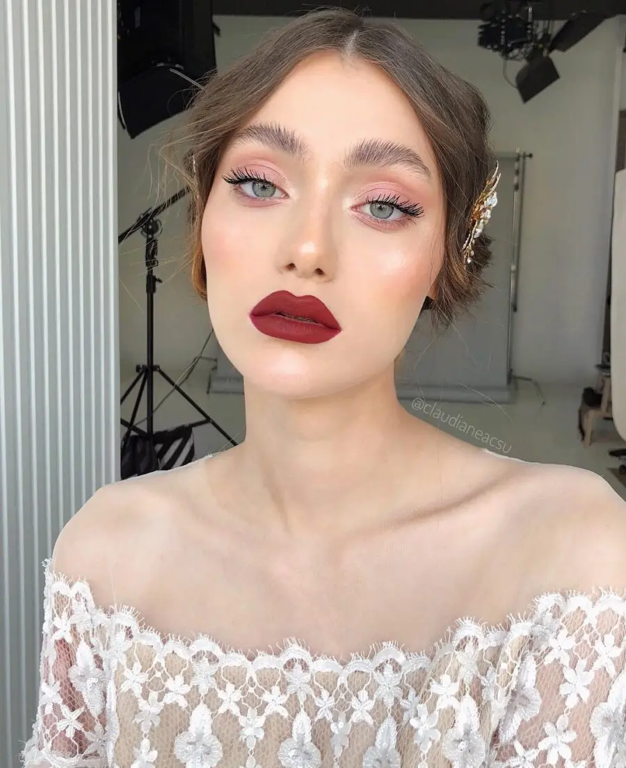 Elegant bridal makeup showcasing bold lips