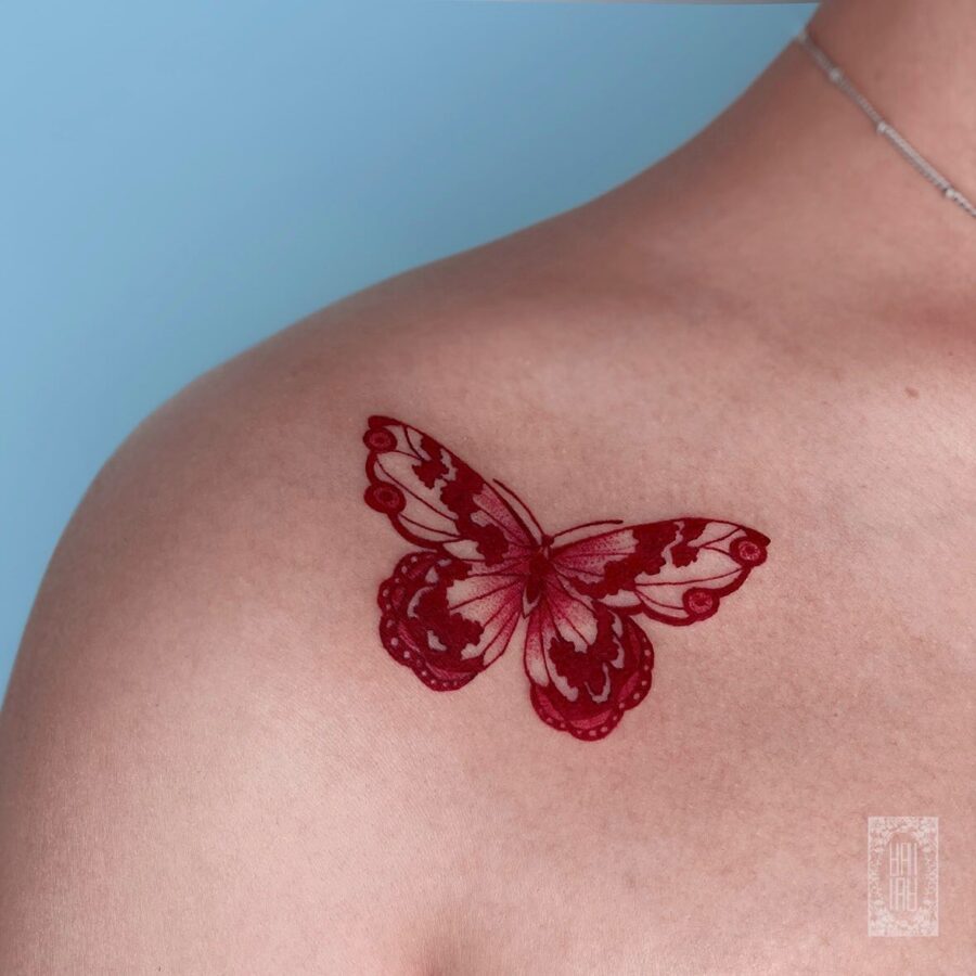Elegant butterfly design in vibrant red ink