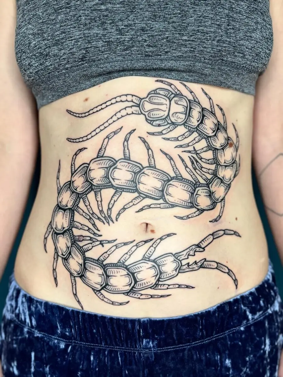 Stunning centipede stomach tattoo design