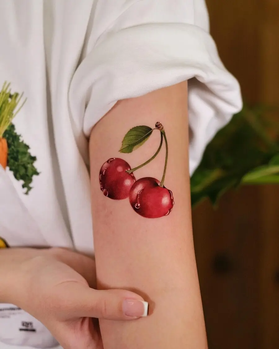 Vibrant Red Cherry Tattoo Design Inspiration