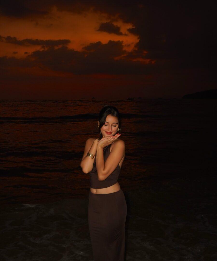 Elegant beachwear against a twilight backdrop