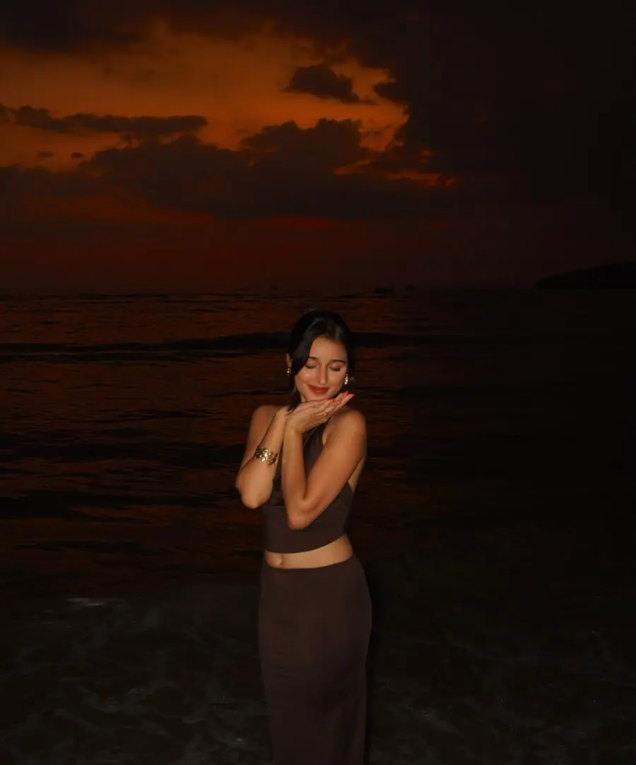 Elegant beachwear against a twilight backdrop