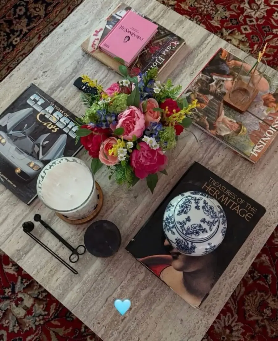 Stylish coffee table decor with books and flowers