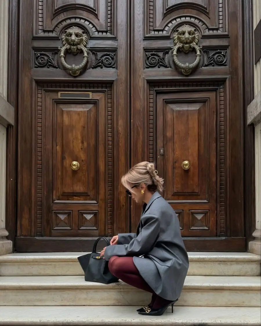 Chic gray blazer paired with wine-colored tights
