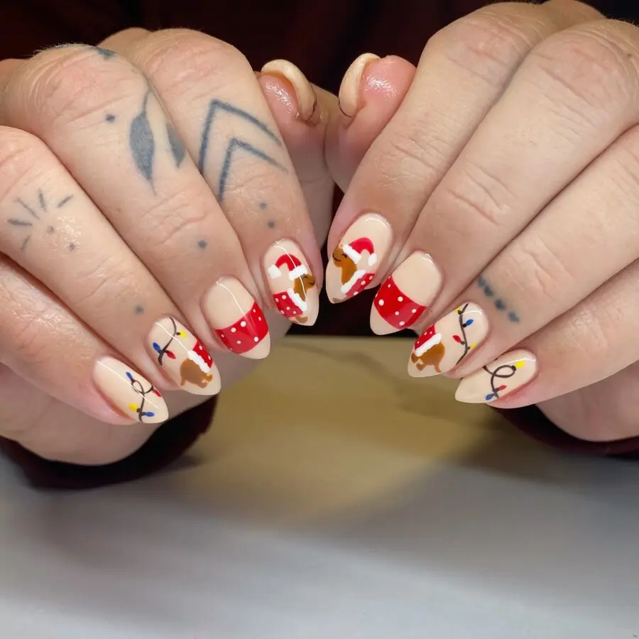 Festive nails featuring playful reindeer art