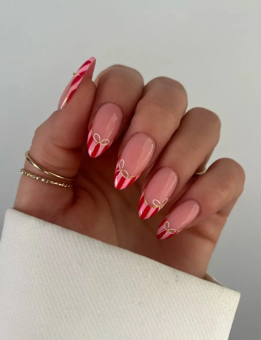 Festive Candy Cane Nail Design with Bows