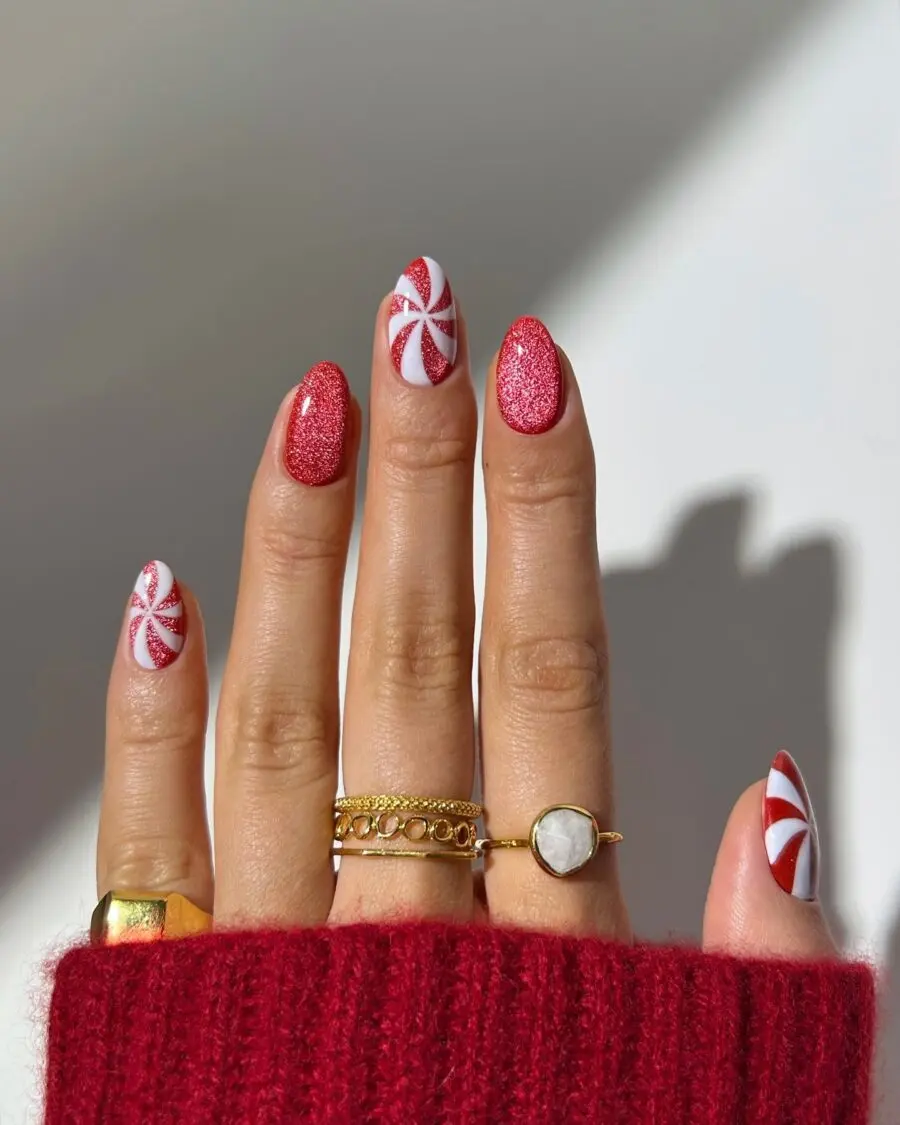 Festive red and white candy-themed nail art