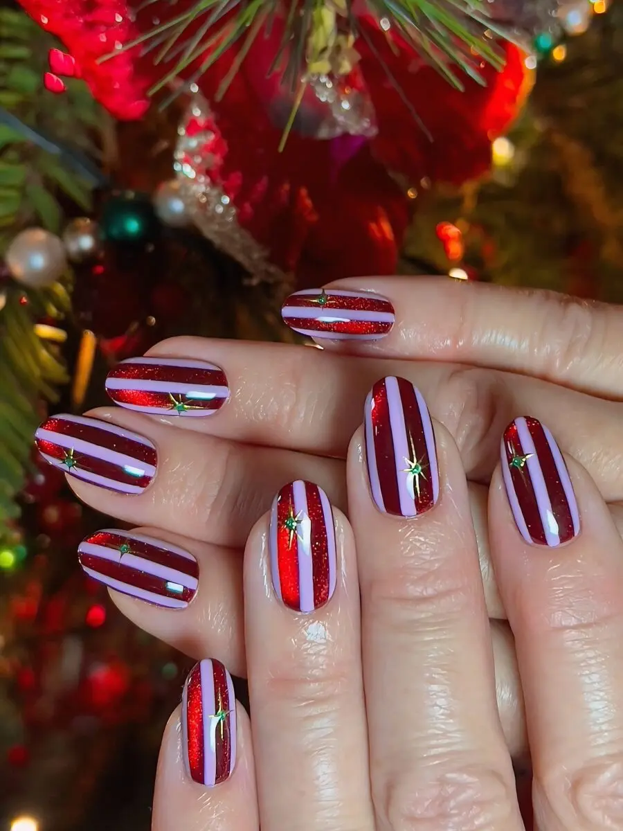 Festive red and white striped nail design