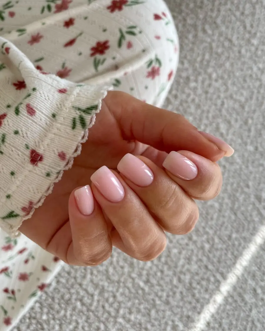 Chic pink nails exuding minimalist elegance