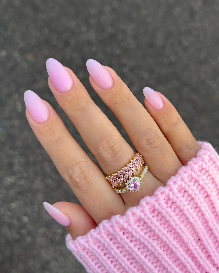 Stylish pink ombre nails with a glossy finish