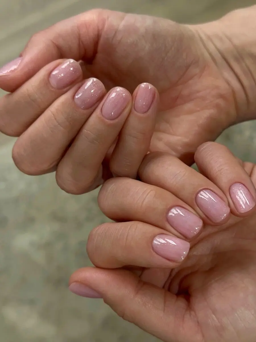 Elegant pink nails with a subtle shimmer