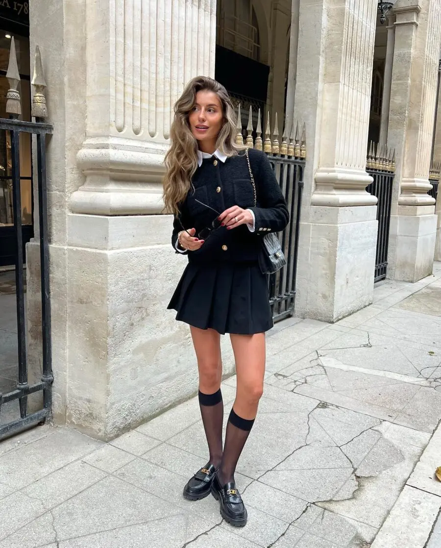 Chic black skirt with stylish layering elements