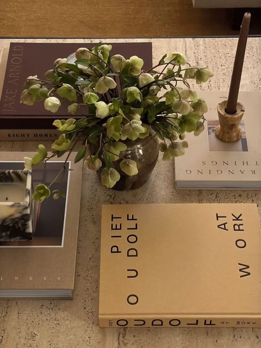 Elegant coffee table arranged with books and decor