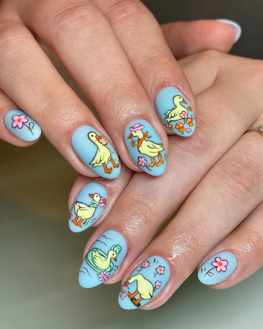 Playful Duck Nail Art with Flower Accents