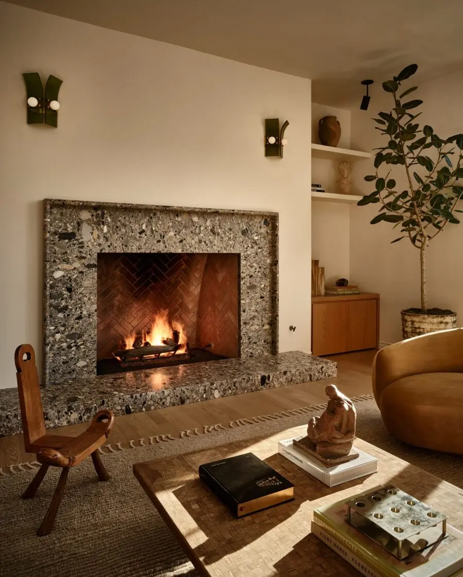 Modern fireplace with earthy textures and tones