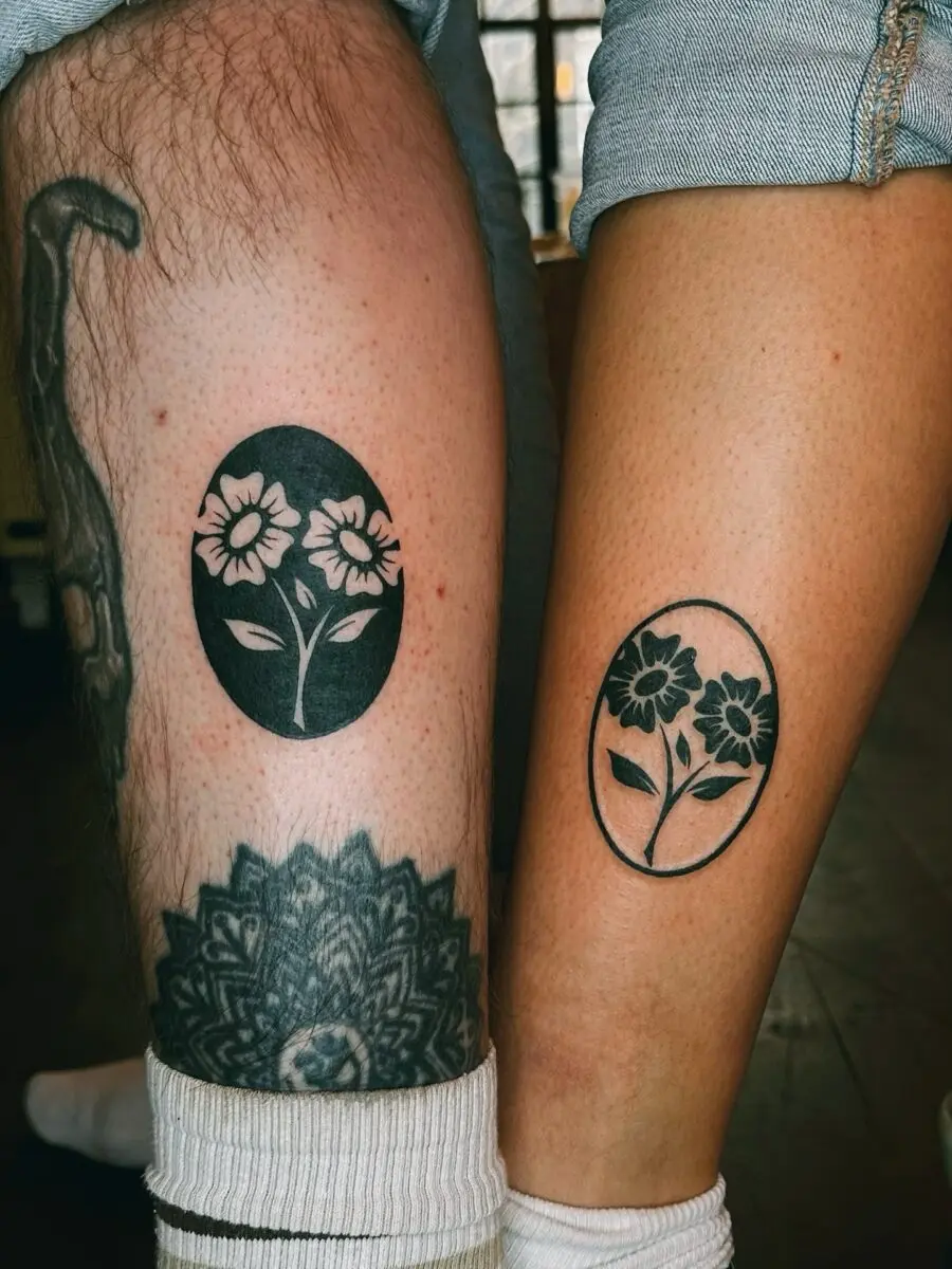Elegantly simple floral tattoos for couples