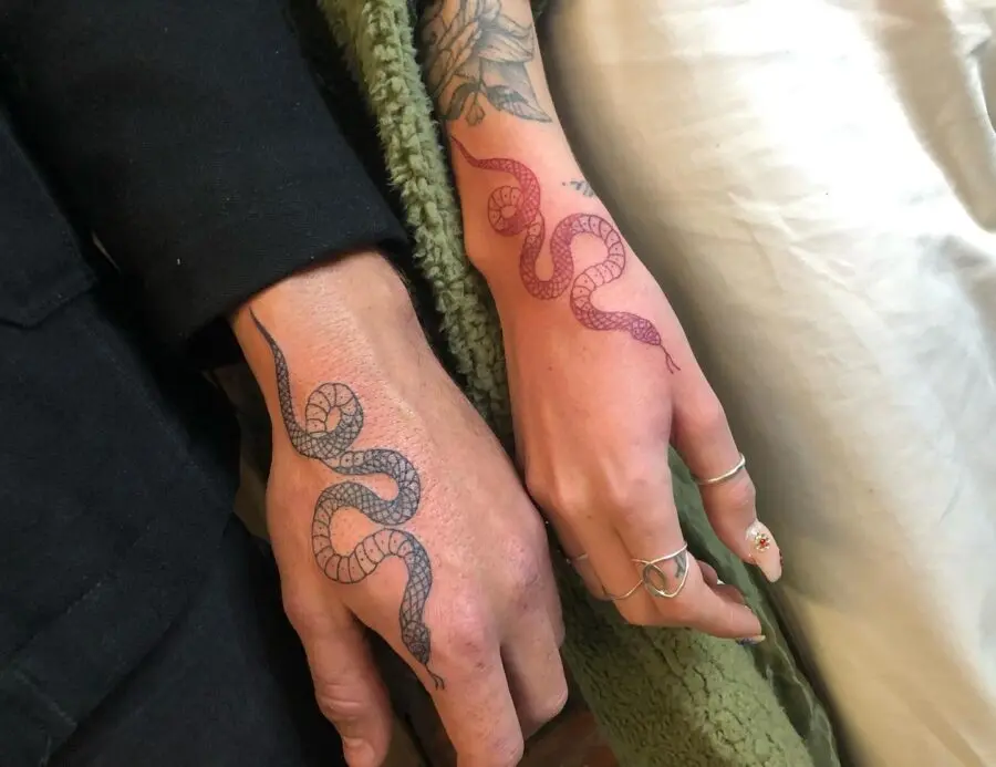 Elegant snake tattoos symbolizing unity and love