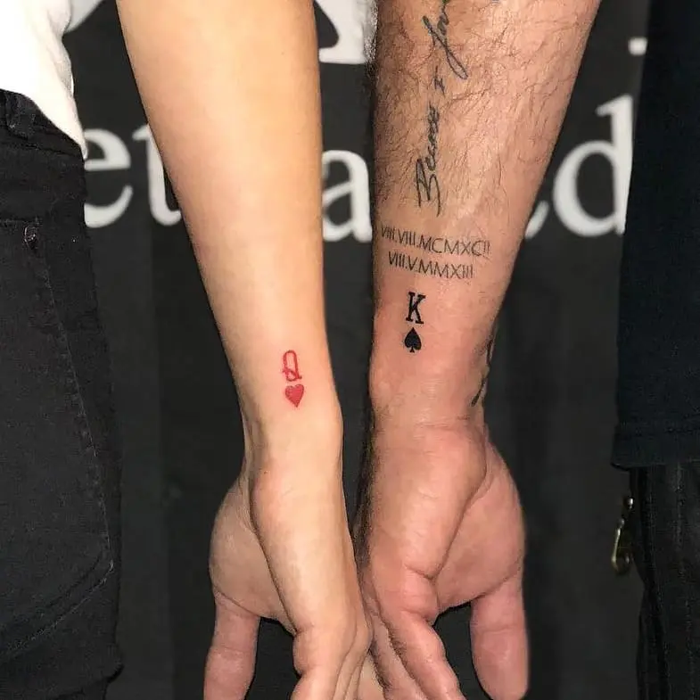 Matching heart and spade couple tattoos