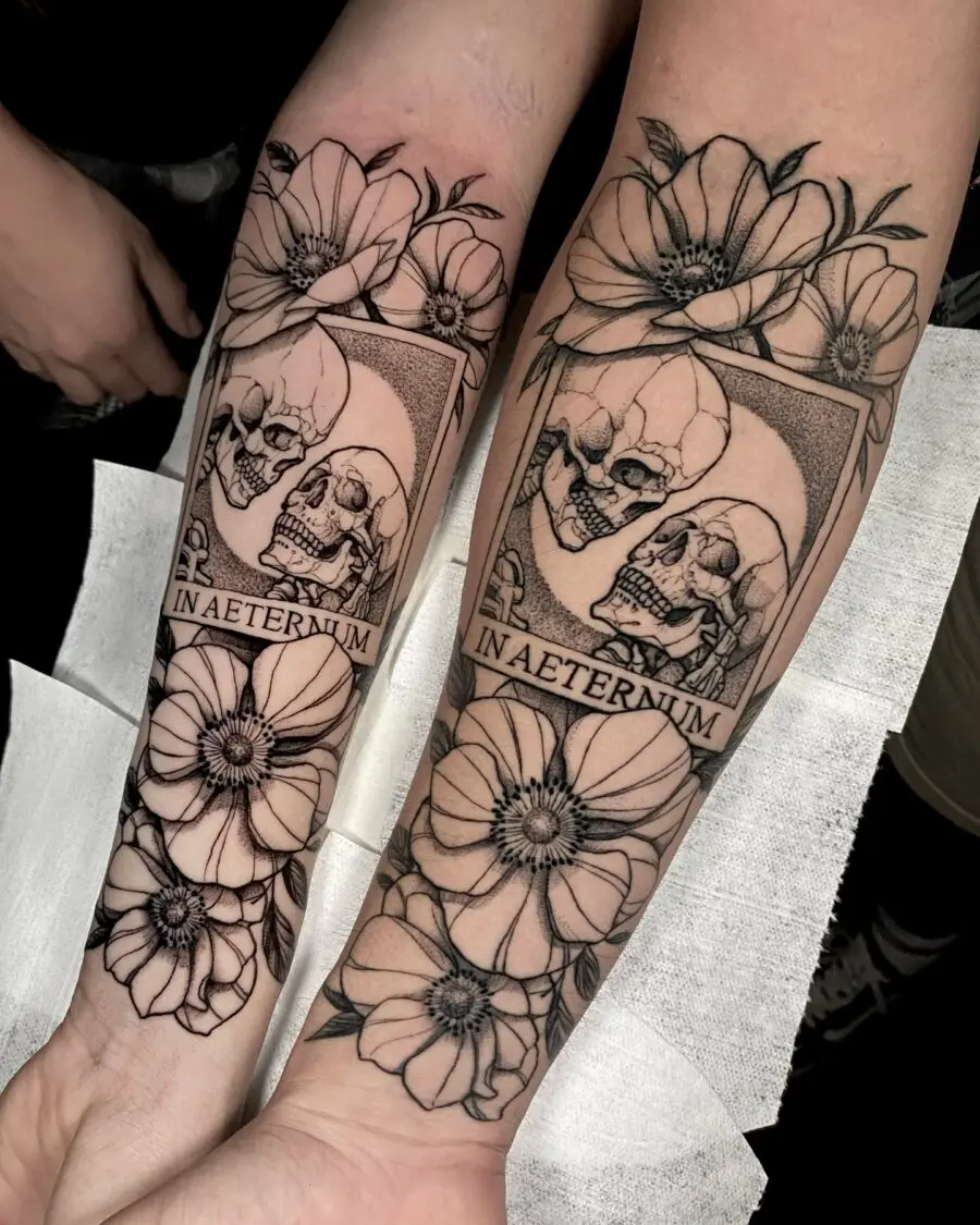 Stylish skull and floral couple tattoos design