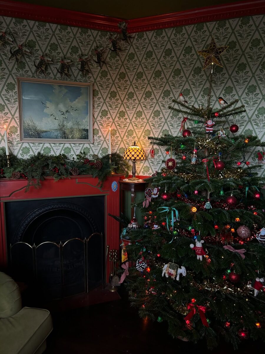 Charming vintage Christmas tree adorns cozy space