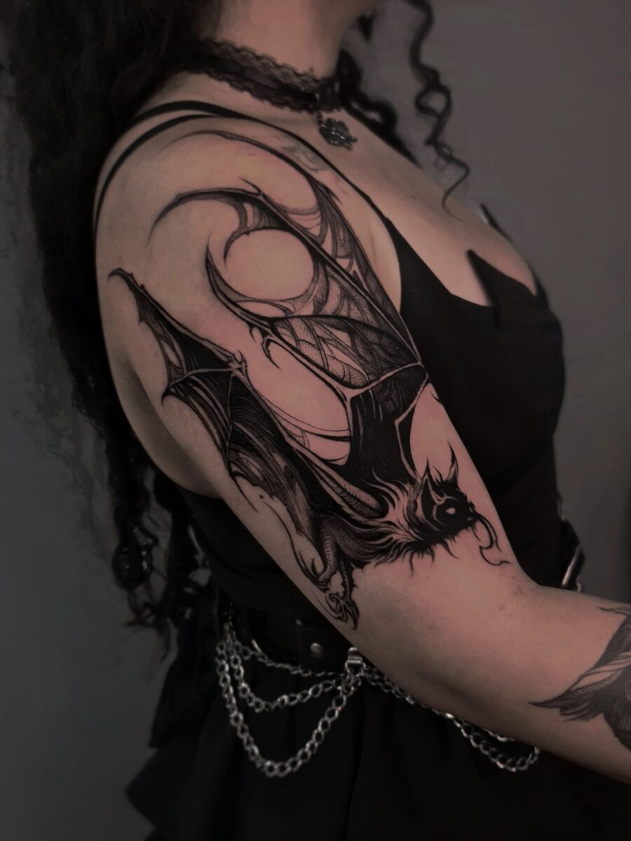 Mystical bat and spider web tattoo art