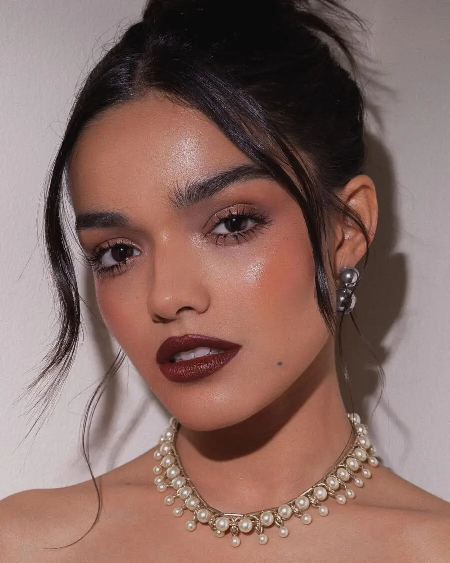 Elevated dark feminine makeup with bold lips
