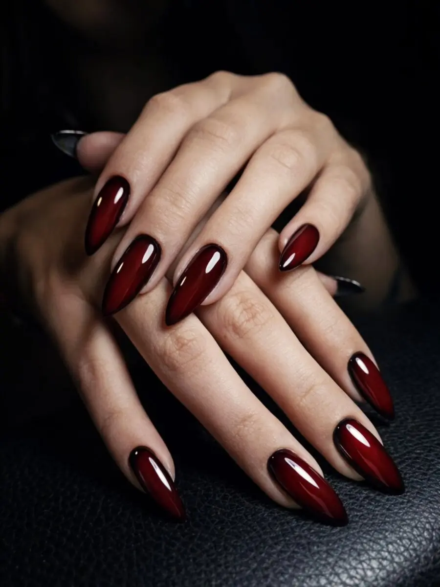 Stunning glossy red oval nails for dark vibes