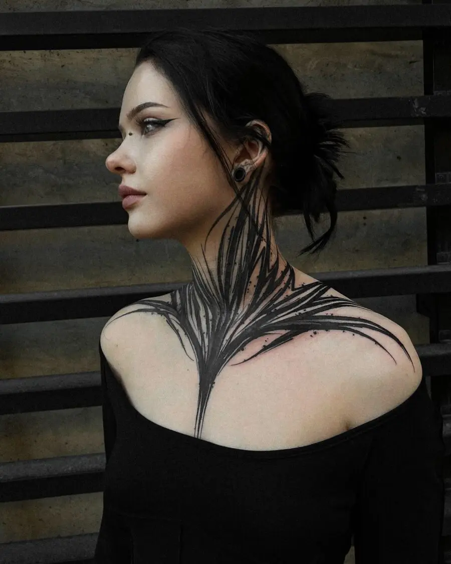 Intricate shoulder tattoo embracing dark femininity