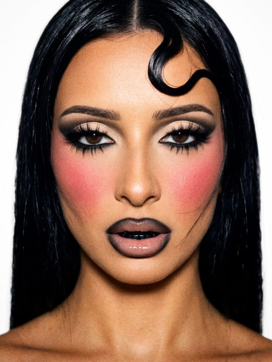 Striking dark feminine glam with bold features