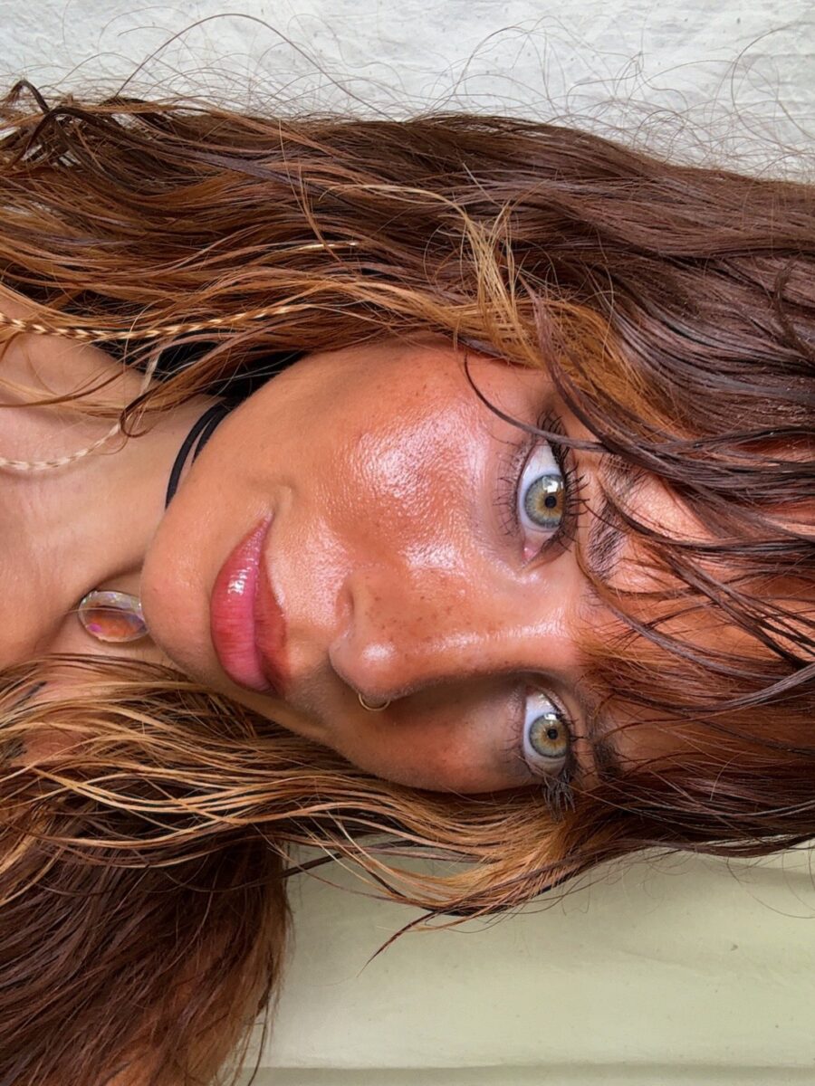 Bold makeup with earthy, glowing finish
