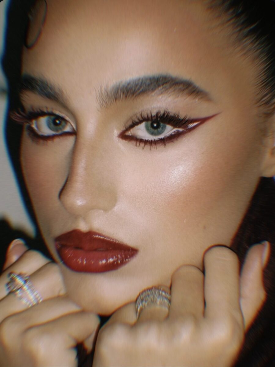 Elegant dark feminine makeup with dramatic flair