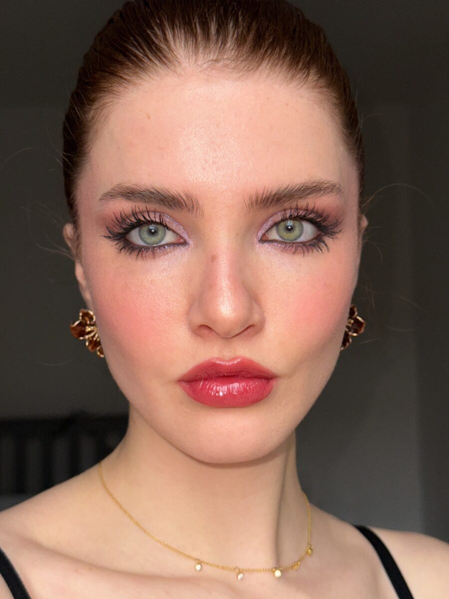 Glamorous dark feminine look with bold features