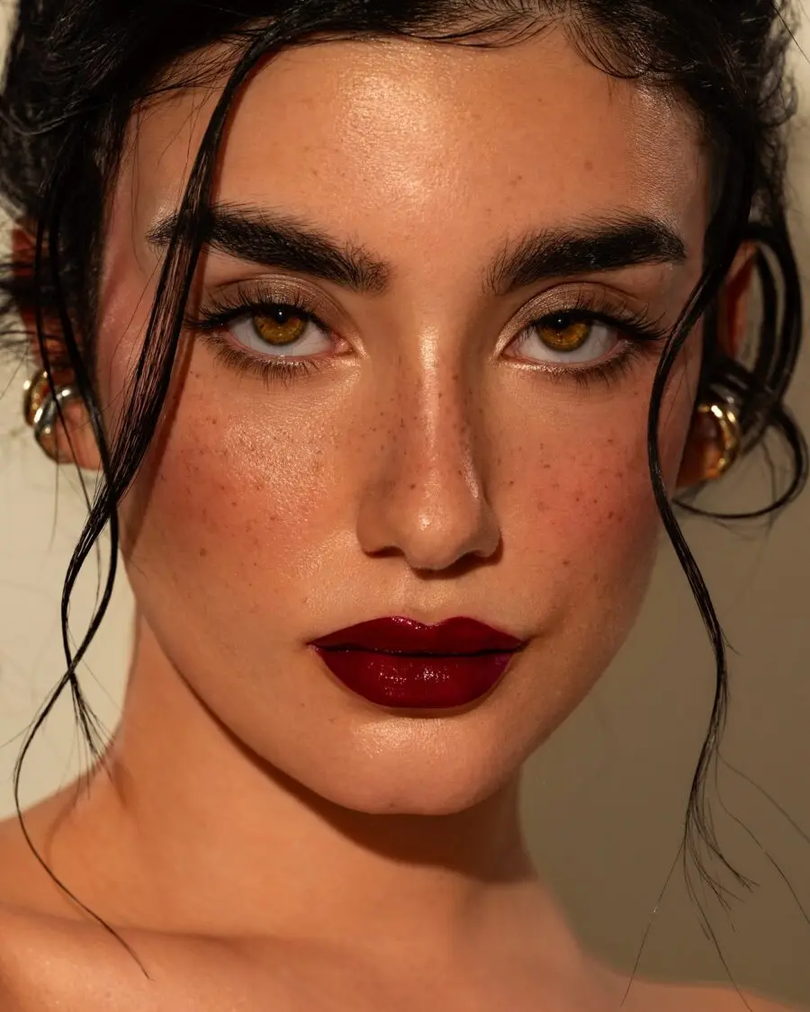 Glamorous dark feminine makeup with bold lips