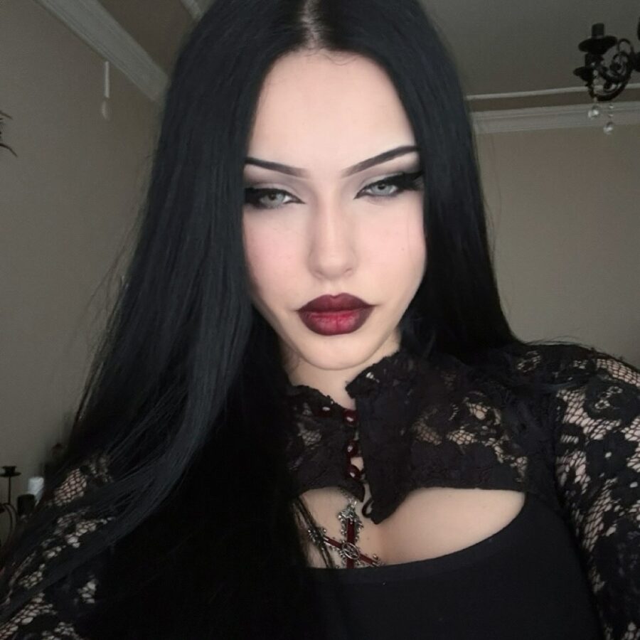 Gothic elegance in dark feminine makeup.