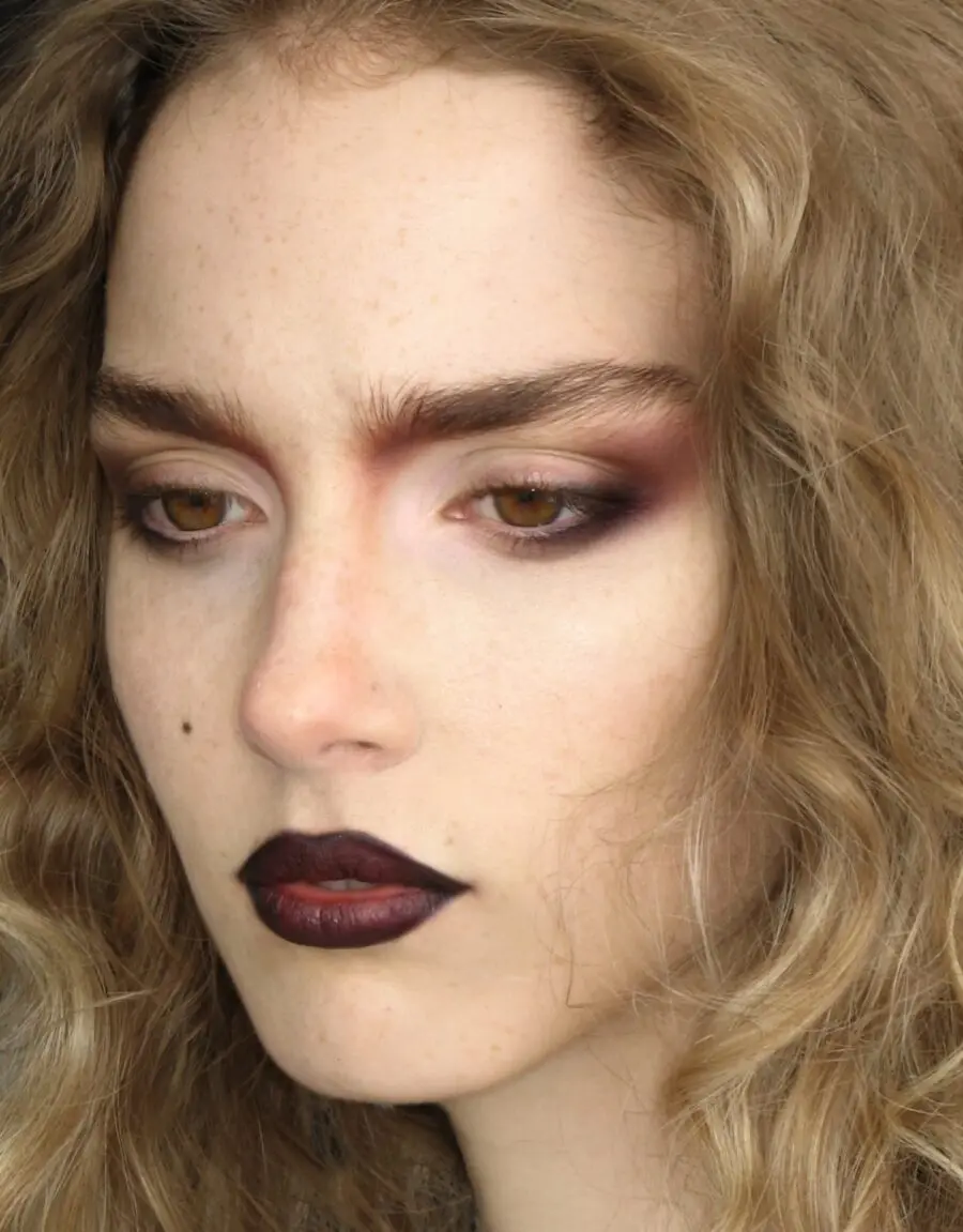 Bold dark lips and smoky eye allure