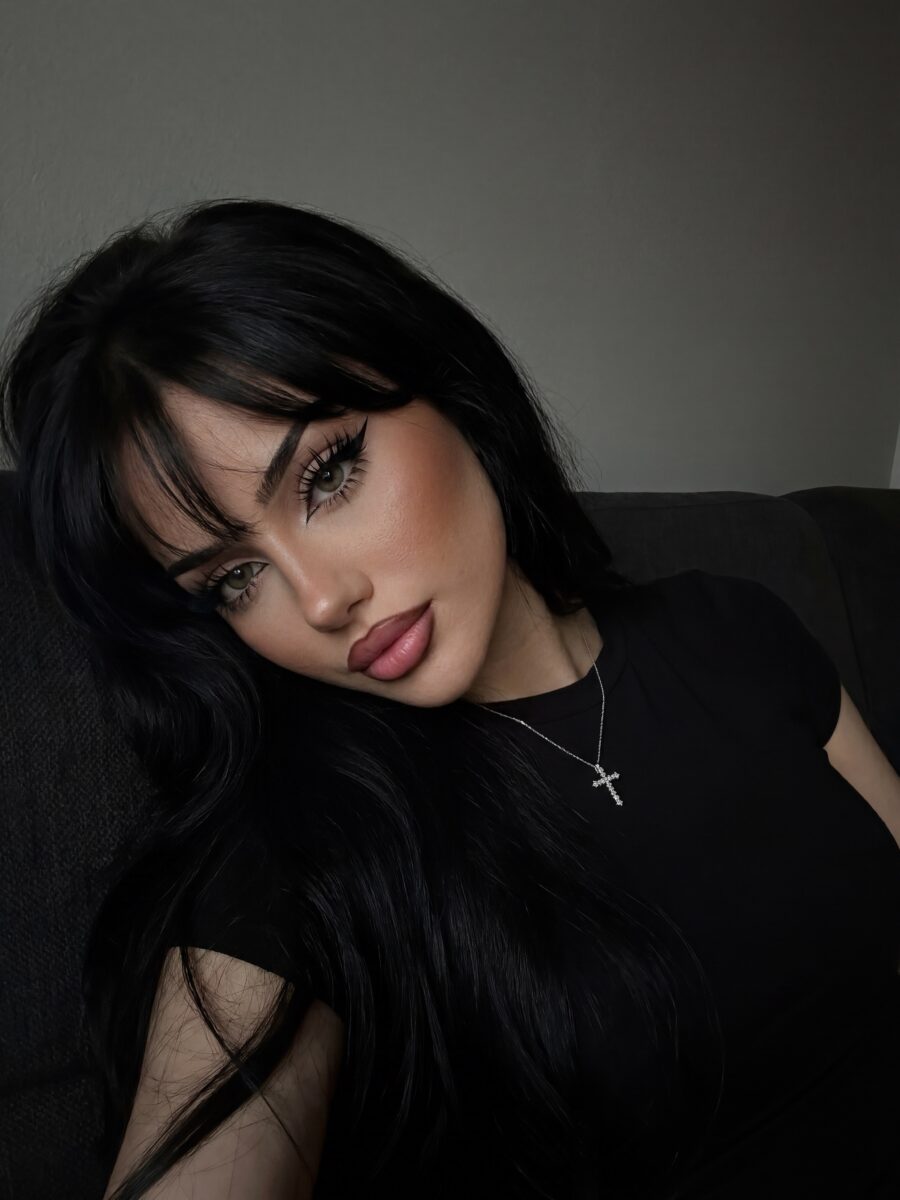 Glamorous dark feminine makeup for a striking look